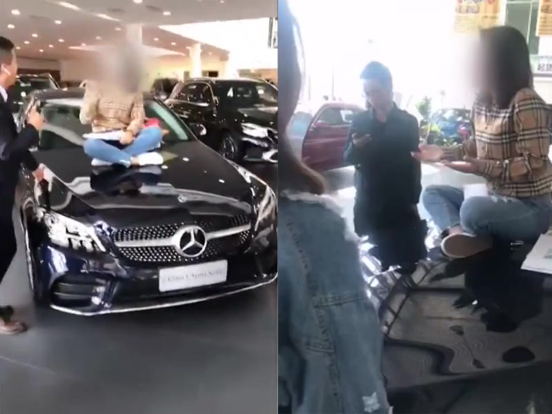 蘭州有女車主坐在引擎蓋維權,鬧出西安女車主維權事件翻版。(網圖)
