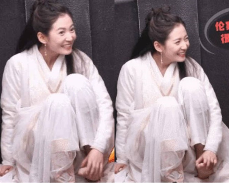 陳鈺琪在拍戲空檔時捽腳趾露出害羞的微笑。網圖