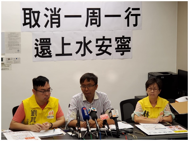 劉其烽(左)、譚凱邦(中)。