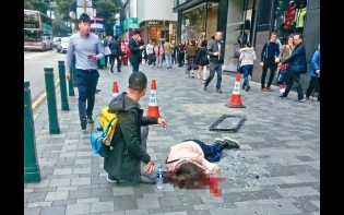 砸殺女遊客 尖沙嘴 鬧市飛窗