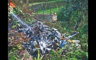 直升機疑空中解體 律師燒成焦炭