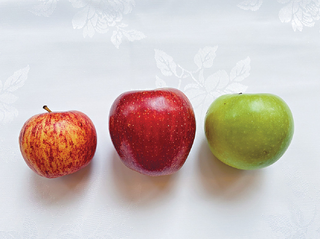 ■市面上流行的蘋果品種，左至右Royal Gala、Envy、Granny Smith。