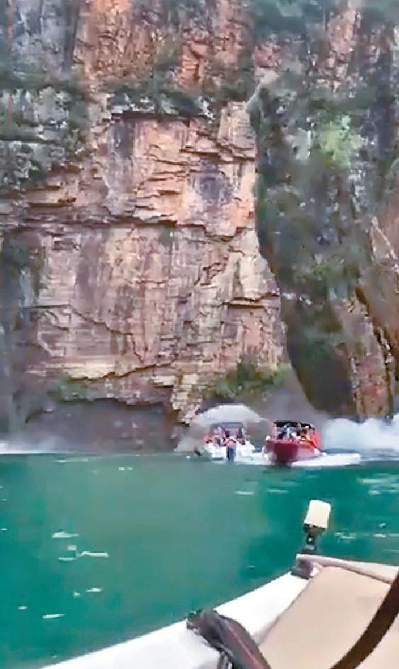 ■巴西東南部旅遊勝地福爾納湖發生崖壁倒塌事故，三艘遊船被波及，其中兩艘遭壓毀。網上圖片