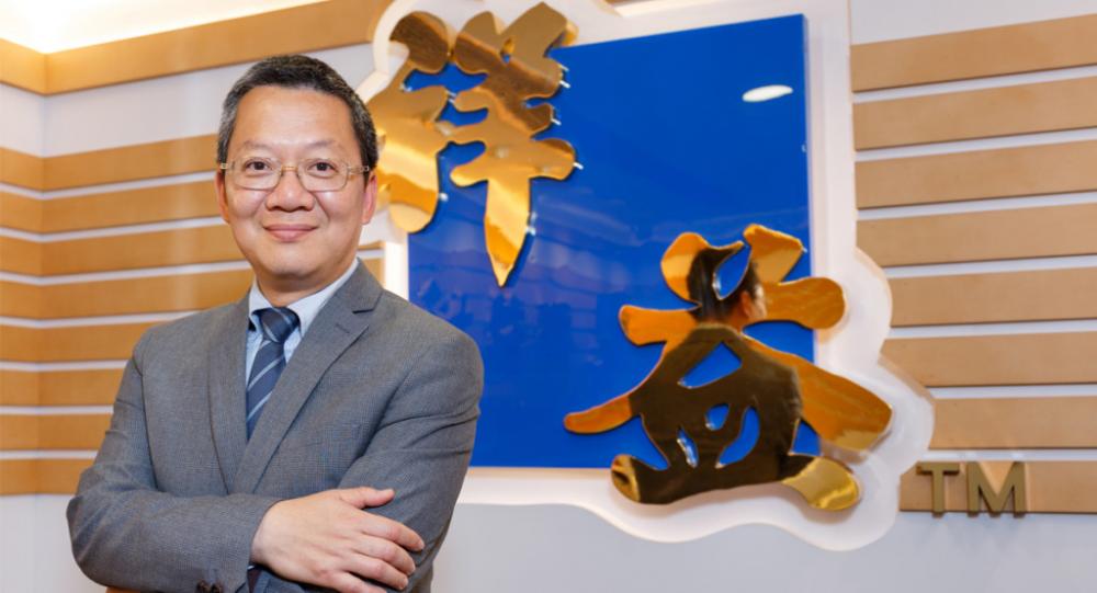 汪敦敬指東西博奕下的香港樓市。